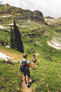 women hiking up Colorado mountain